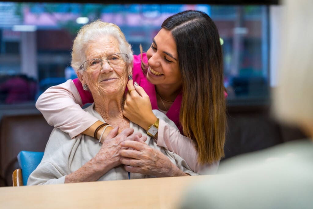 caring lifestyle coordinator with resident